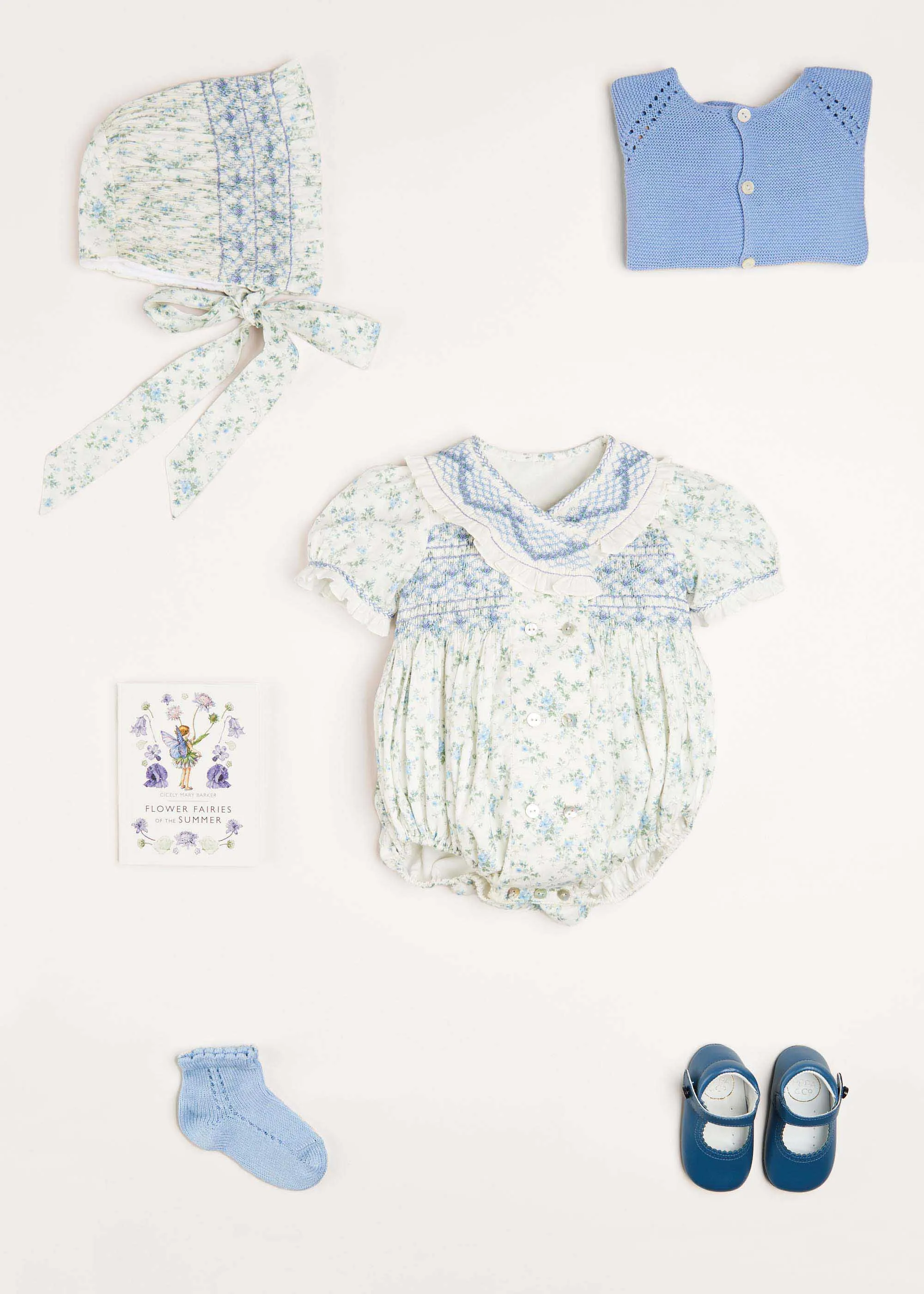 Alice Floral Print Handsmocked Double Breasted Short Sleeve Romper in Blue (6mths-2yrs)